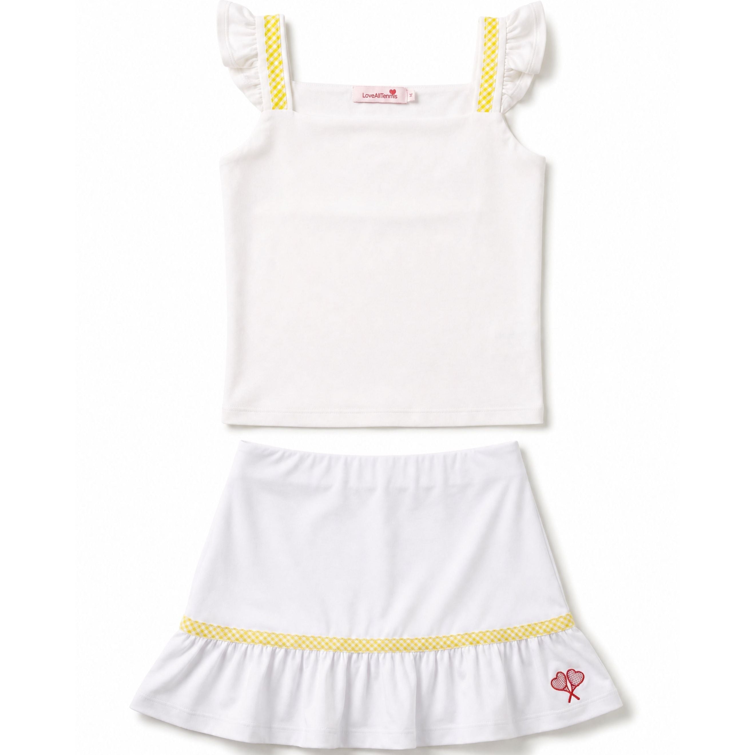White dress with yellow trim on a white background
