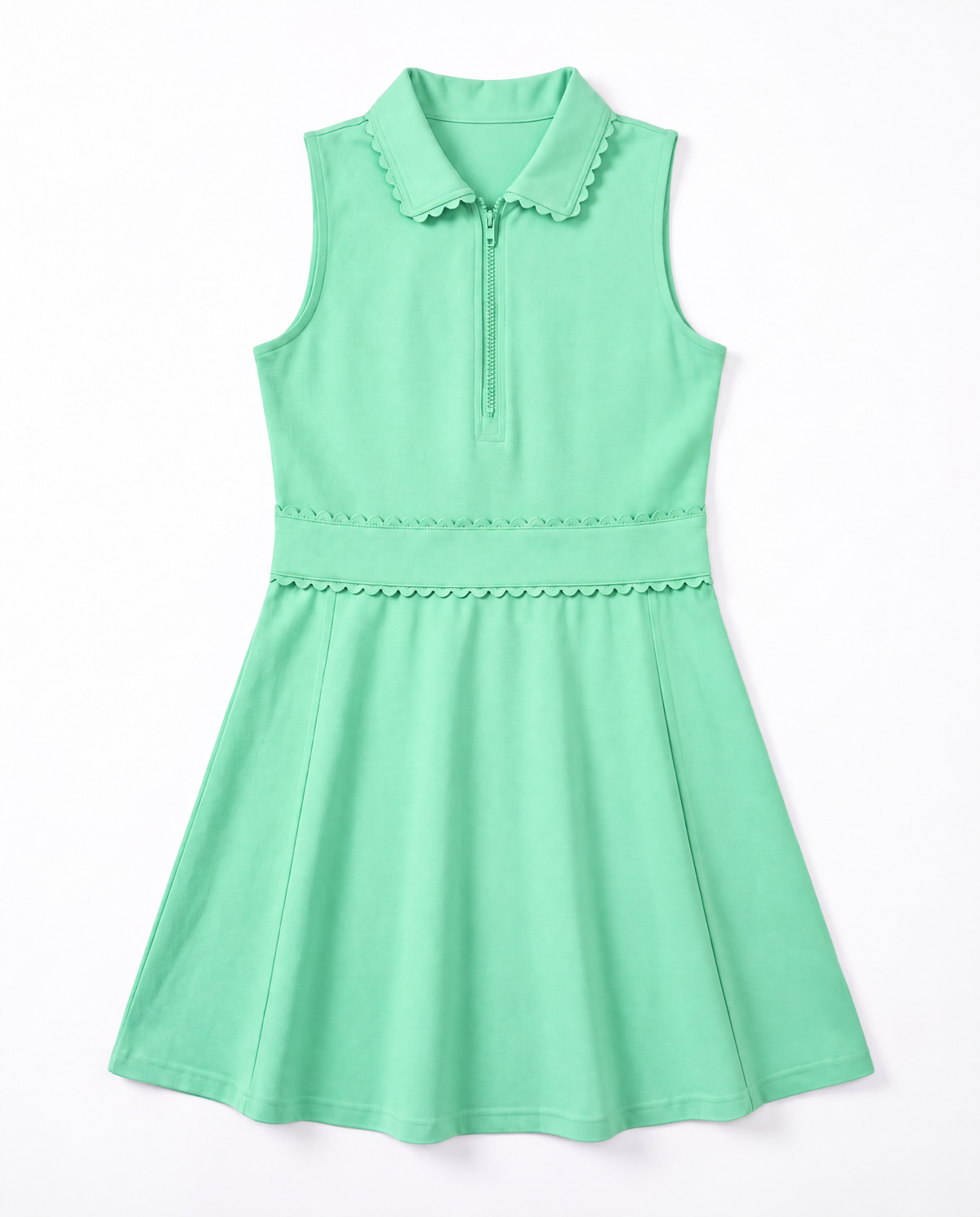 A mint green sleeveless dress with a half-zip collar, scalloped trim details, and a flared skirt, shown against a plain white background.