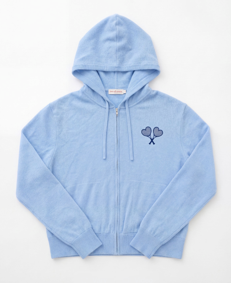 Light blue hoodie with a logo on the chest against a white background