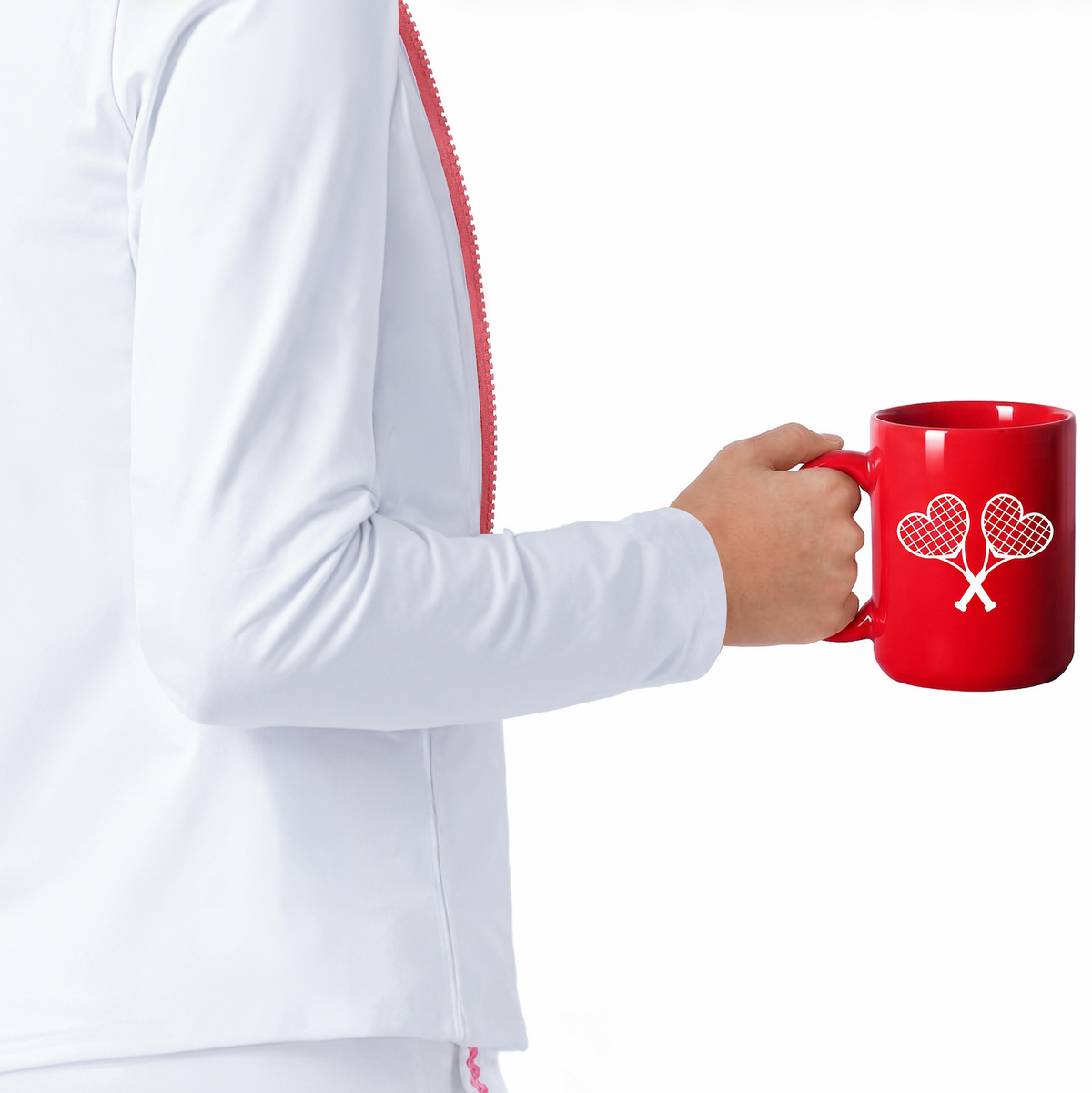 A person in a white athletic jacket holding a bright red ceramic mug with a white crossed tennis rackets graphic on the side, set against a plain white background.