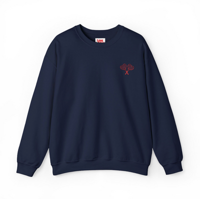 Navy blue sweatshirt with a small red logo on a white background