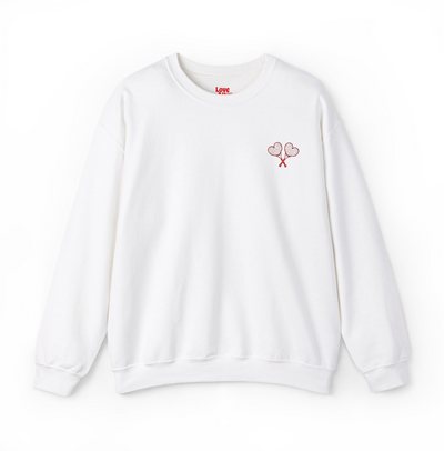 White sweatshirt with tennis racket and ball design on a white background