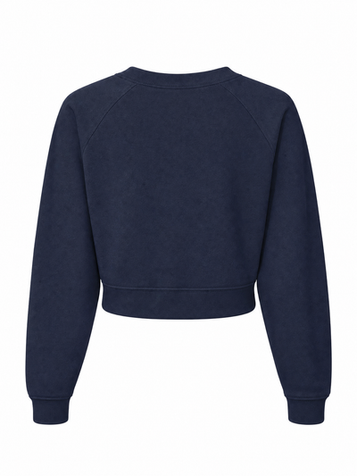 A navy blue cropped crewneck sweatshirt with raglan sleeves, shown from the back on a plain white background.