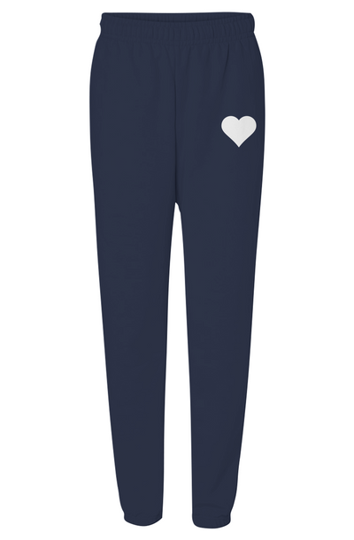Navy sweatpants with white heart logo on flat white background