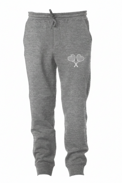 Gray sweatpants with a heart and tennis racket design on a white background