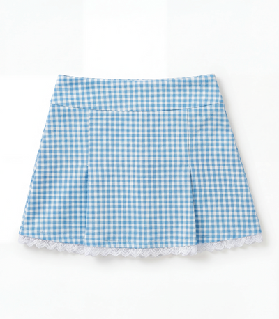 Blue and white gingham skirt with white lace trim on a flat white background