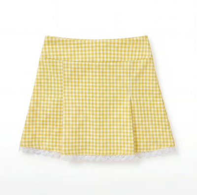 Yellow and white gingham skirt with white lace trim on a flat white background