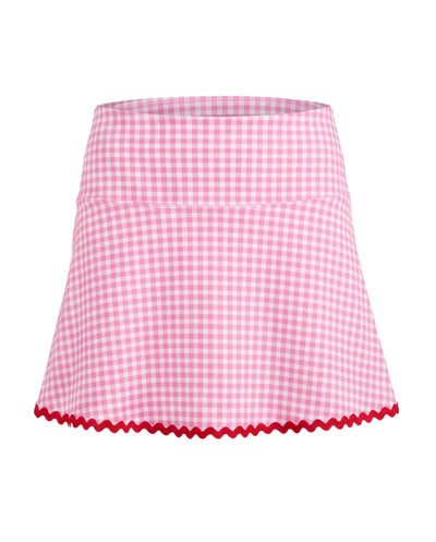 Pink and white gingham skirt with red trim on flat white background