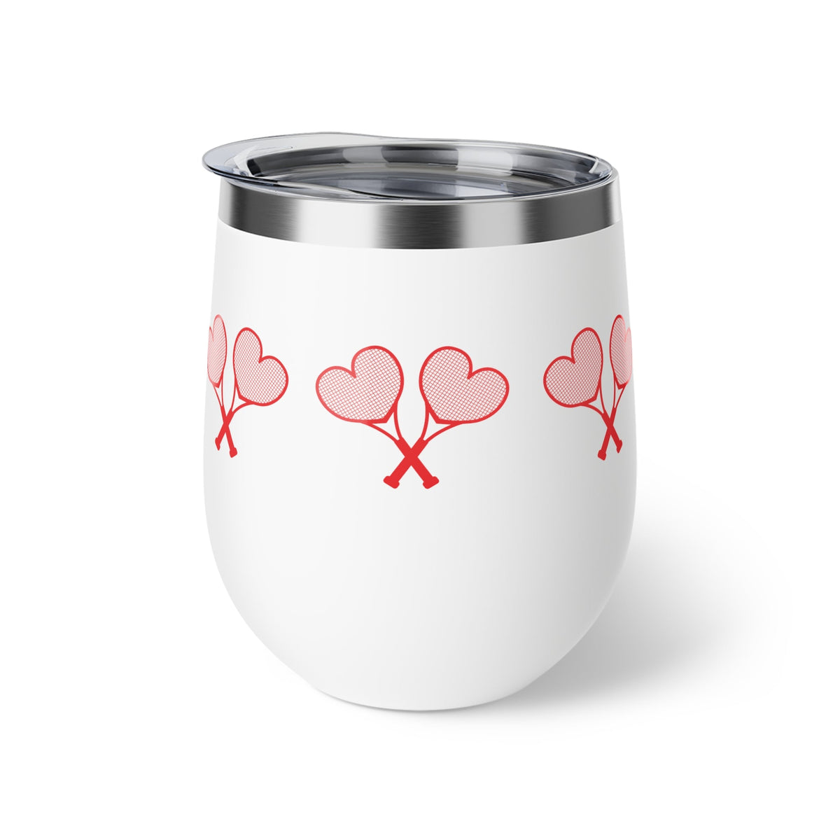 White tumbler with red heart designs on a white background