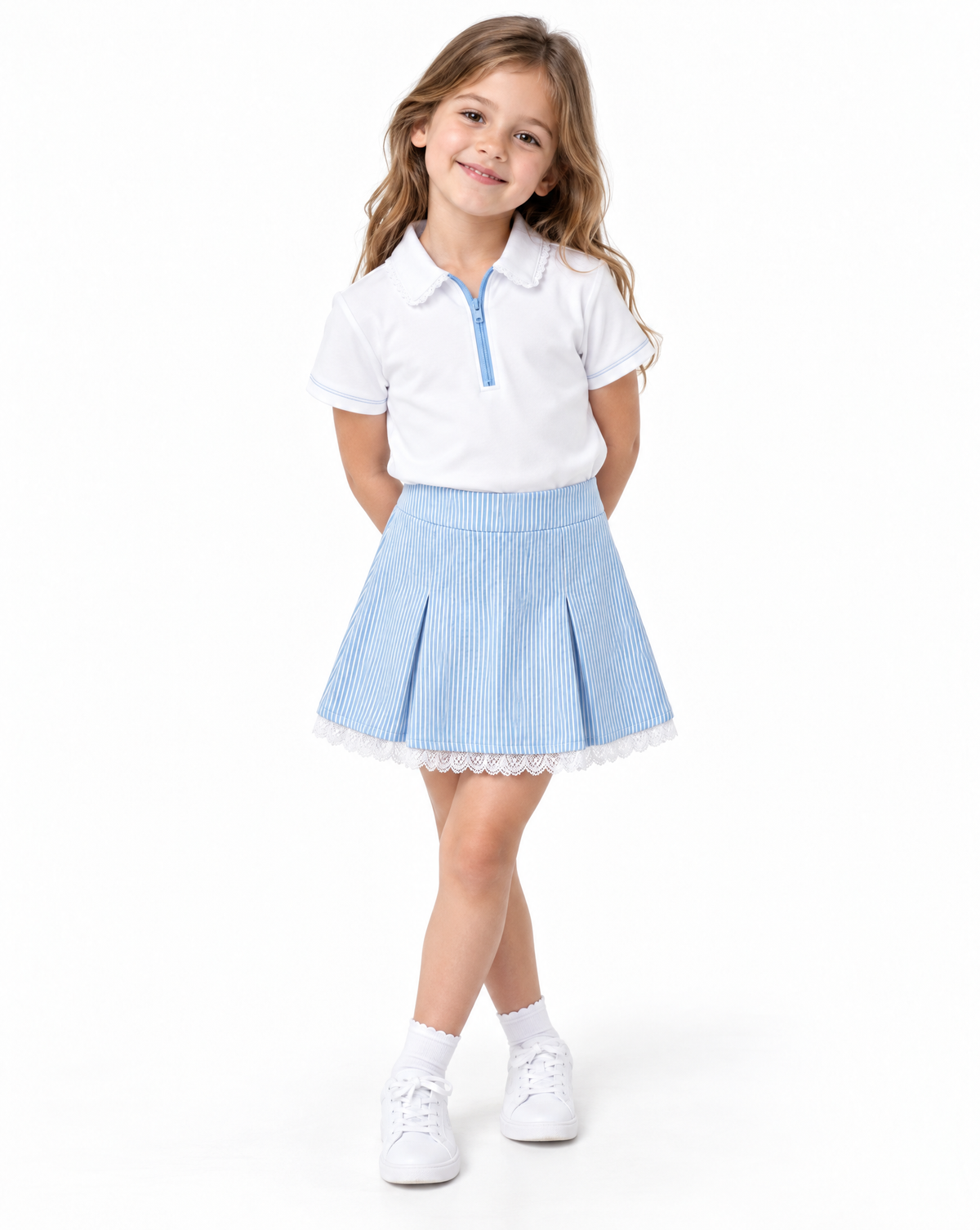 A young girl modeling a school uniform set consisting of a white short-sleeve polo shirt with a light blue collar and zipper, paired with a light blue and white vertically striped pleated skirt with a white lace hem.