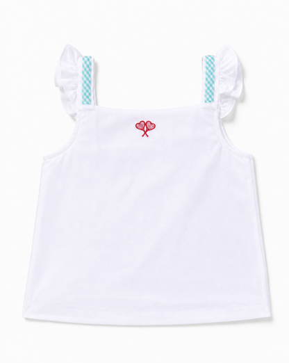 A white sleeveless children's top with ruffled shoulder straps featuring a light blue and white checkered pattern, and a small red embroidered motif at the center of the chest.