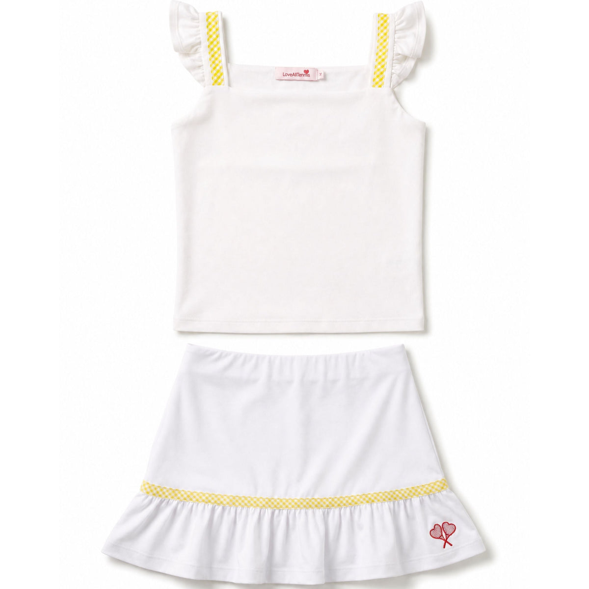 White dress with yellow trim on a white background