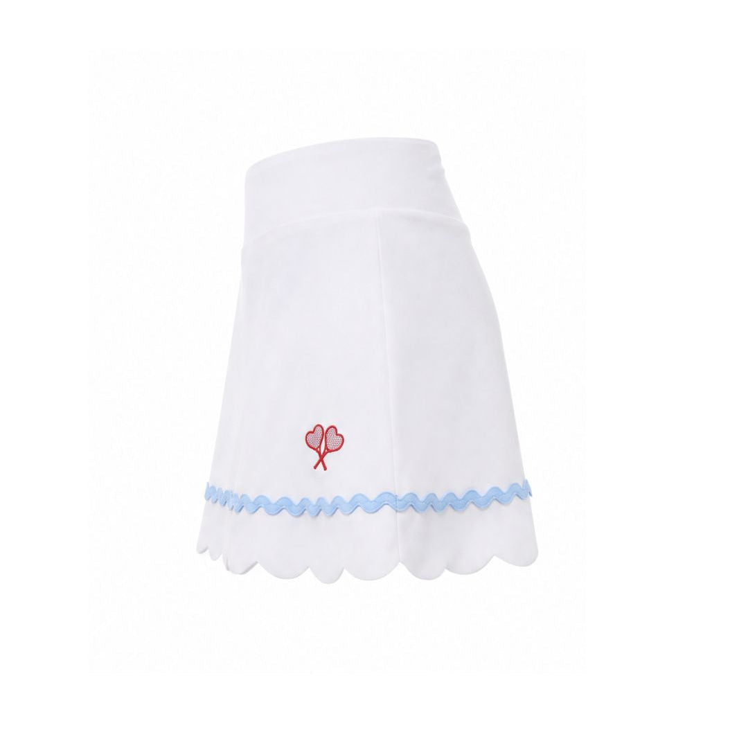 White skirt with scalloped hem and red flower design on a white background