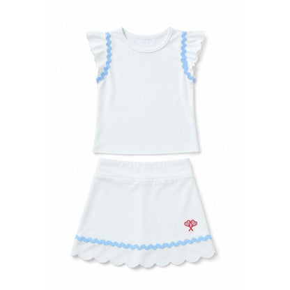 White top and skort with blue trim and a red heart design on a white background