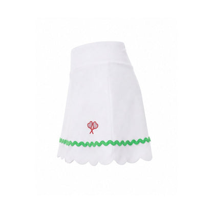 White skirt with green trim and red flower design on a white background