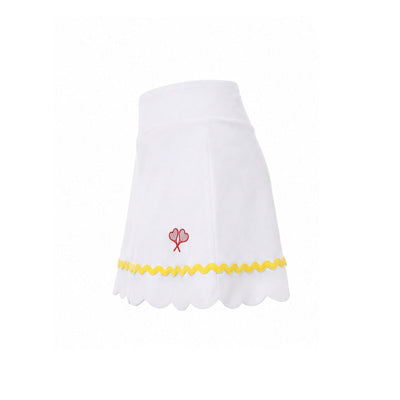 White skirt with yellow trim and red flower design on a white background