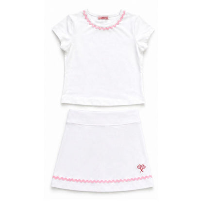 White dress with pink trim on a white background