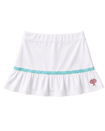 A white girls' tennis skirt with a ruffled hem, featuring a turquoise and white checkered waistband stripe and a small red embroidered tennis racket on the left side.