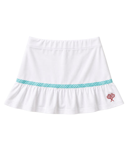 A white girls' tennis skirt with a ruffled hem, featuring a turquoise and white checkered waistband stripe and a small red embroidered tennis racket on the left side.