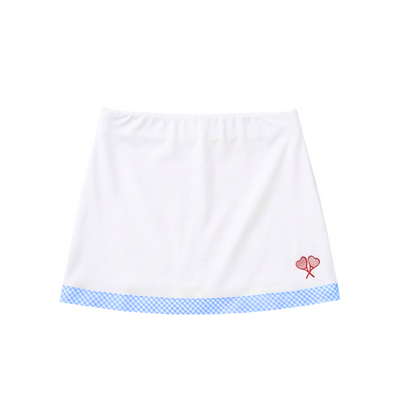 White skirt with blue trim and red heart design on a white background