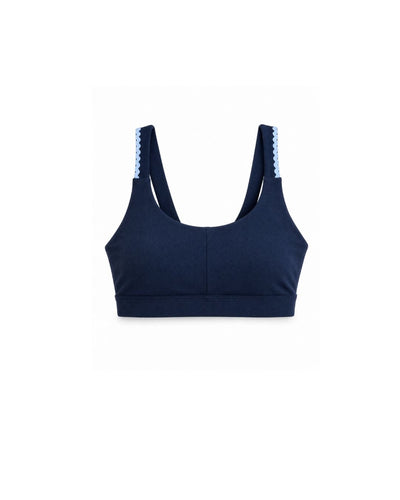 Navy blue sports bra with light blue trim on a white background