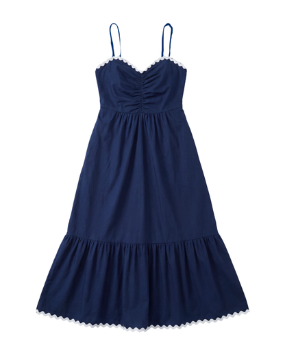 Navy blue dress with thin straps on a white background