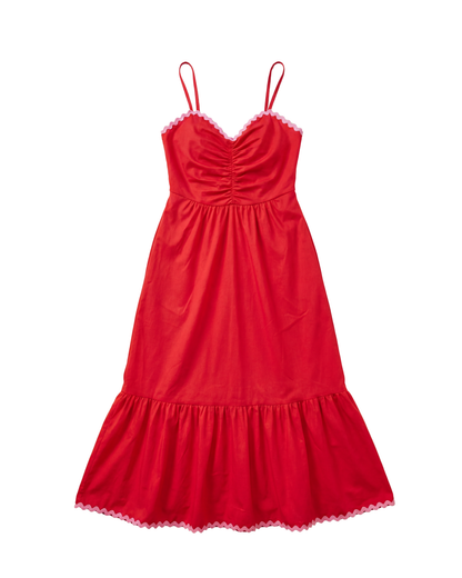 Red dress with pink trim on a white background