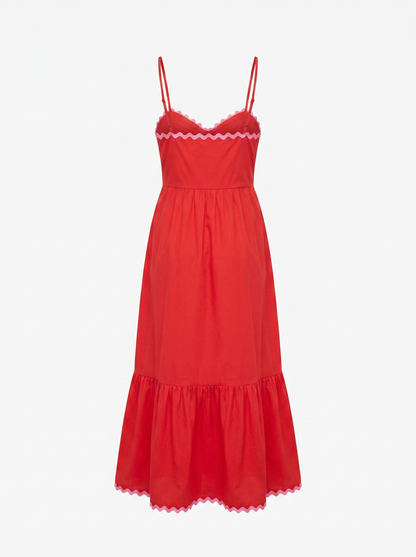 A red spaghetti-strap midi dress with a tiered skirt and delicate white lace trim at the bust and hem, shown against a plain white background.