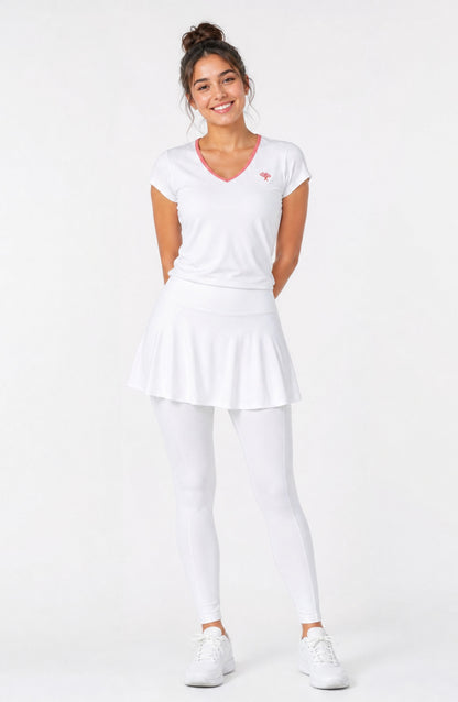 Woman wearing a white tennis outfit with a logo on a white background
