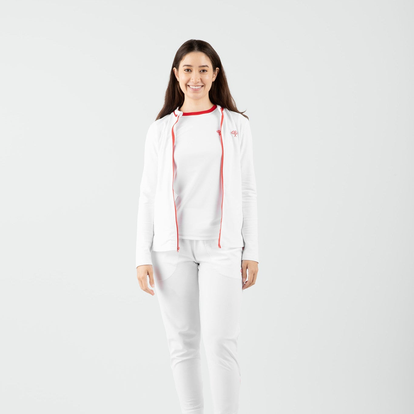 Person wearing a white outfit with red accents on a white background