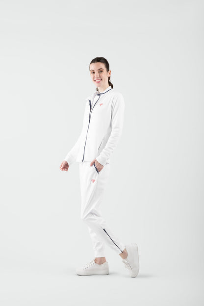 Person wearing a white pants on a plain background