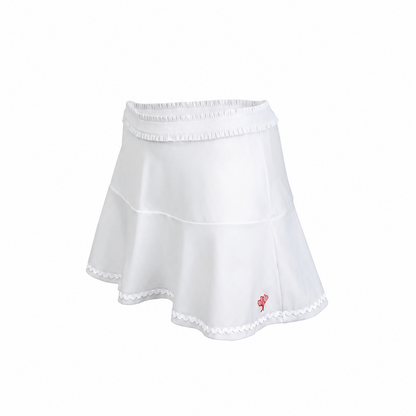 White skirt with a small red logo on a white background