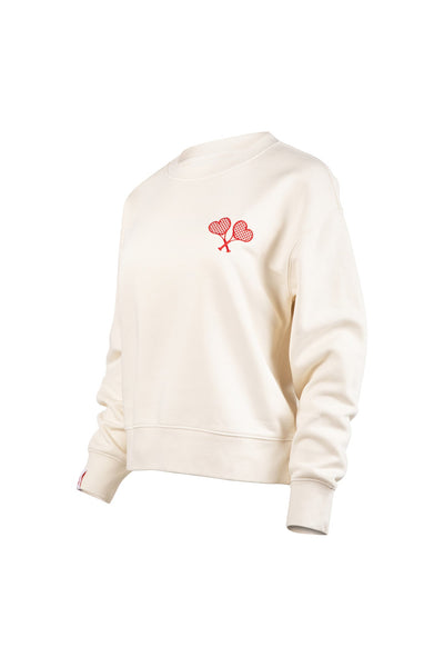 White sweatshirt with red heart design on a white background