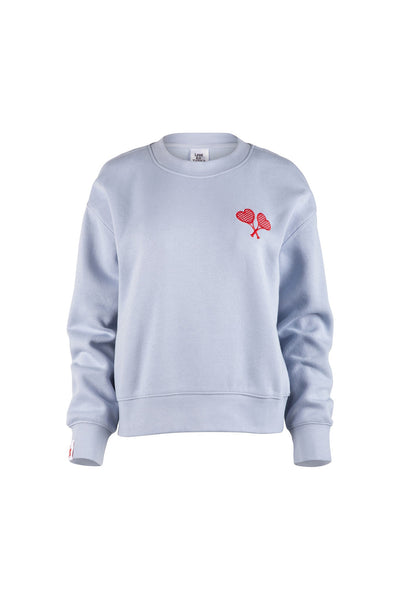 Light blue sweatshirt with red heart design on a white background