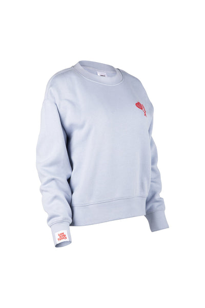 Light blue sweatshirt with a red logo on a white background