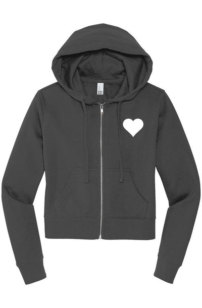 Black zip hoodie with heart logo on flat white background