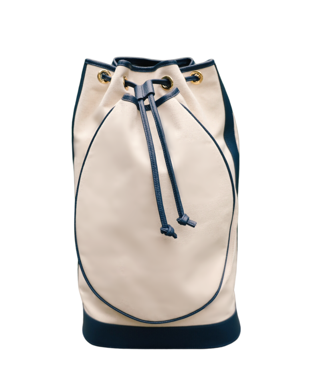 A cream-colored leather bucket bag with dark navy blue trim, drawstring, and base, accented with gold-tone grommets, shown against a plain white background.